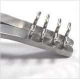 Alms Retractor